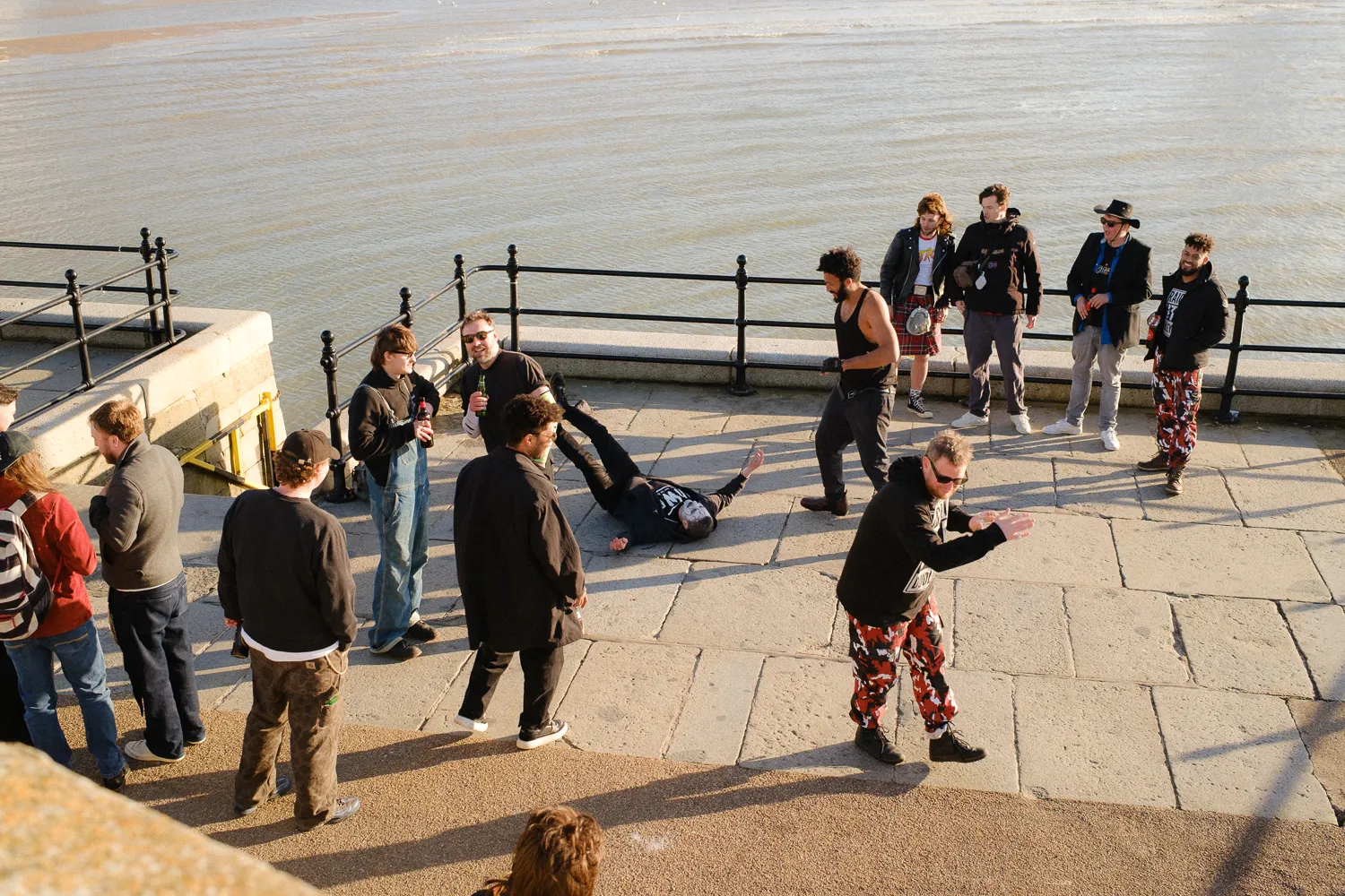 A group gathered on the Margate harbour arm